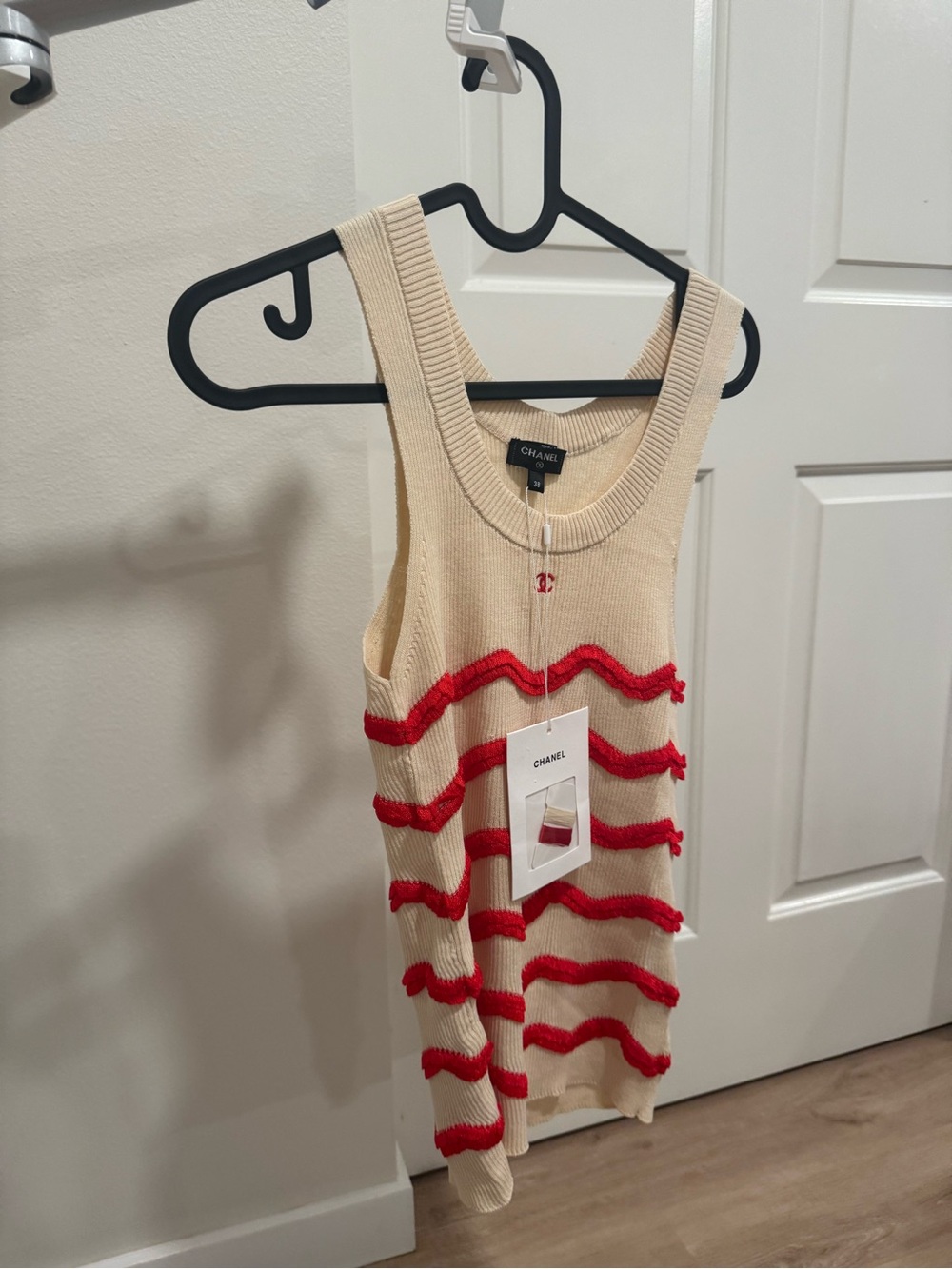 CHANEL Cream Knit Tank with Red Wave Stripes and Logo Charm
